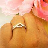 0.05 Carat (ctw) Sterling Silver Round Diamond Ladies Infinity Love Swirl Wedding Anniversary Ring
