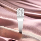 0.63 ctw Baguette And Round White Diamond Crossover Swirl Engagement Ring for Women in 925 Sterling Silver