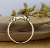0.15 Carat (ctw) 10K Yellow Gold Round Black and White Diamond Ladies Promise Three Heart Infinity Love Engagement Ring