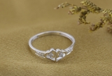 0.15 Carat (ctw) Sterling Silver Round White Diamond Ladies Promise Double Heart Love Engagement Ring