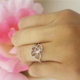 0.10 Carat (ctw) Sterling Silver Round Brilliant Diamond Ladies Promise Three Heart Infinity Love Engagement Ring