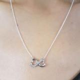 0.10 Carat (ctw) 14K White Gold Round White Diamond Ladies Double Heart Infinity Love Pendant 1/10 CT