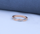 0.15 Carat (ctw) 14K Rose Gold Round Cut Diamond Ladies Bridal Anniversary Wedding Band Stackable Swirl Ring