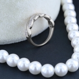 0.15 Carat (ctw) 14K White Gold Round Cut Diamond Ladies Bridal Anniversary Wedding Band Stackable Swirl Ring