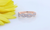 0.60 Carat (ctw) 18K Rose Gold Round Cubic Zirconia Ladies Bridal Anniversary Wedding Band Stackable Swirl Ring