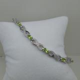 2.38 Carat (ctw) Sterling Silver Real Oval Cut Peridot & Round Cut White Diamond Ladies Infinity Link Tennis Bracelet