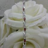 2.70 Carat (ctw) Sterling Silver Real Oval Cut Garnet & Round Cut White Diamond Ladies Infinity Link Tennis Bracelet
