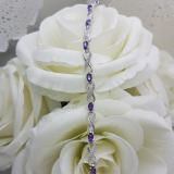 2.26 Carat (ctw) Sterling Silver Real Oval Cut Amethyst & Round Cut White Diamond Ladies Infinity Link Tennis Bracelet