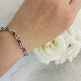 3.51 Carat (ctw) Sterling Silver Real Oval Cut Garnet & Round Cut White Diamond Ladies Infinity Link Tennis Bracelet