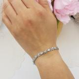 2.76 Carat (ctw) Sterling Silver Real Oval Cut Blue Topaz & Round Cut White Diamond Ladies Infinity Link Tennis Bracelet