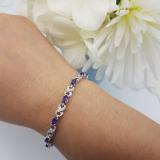 2.94 Carat (ctw) Sterling Silver Real Oval Cut Amethyst & Round Cut White Diamond Ladies Infinity Link Tennis Bracelet