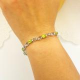 4.11 Carat (ctw) Sterling Silver Real Oval Cut Peridot & Round Cut White Diamond Ladies Infinity Link Tennis Bracelet