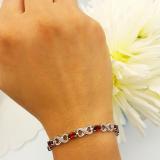 5.47 Carat (ctw) Sterling Silver Real Oval Cut Garnet & Round Cut White Diamond Ladies Infinity Link Tennis Bracelet