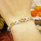 4.26 Carat (ctw) Sterling Silver Real Oval Cut Citrine & Round Cut White Diamond Ladies Infinity Link Tennis Bracelet