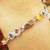 4.26 Carat (ctw) Sterling Silver Real Oval Cut Citrine & Round Cut White Diamond Ladies Infinity Link Tennis Bracelet