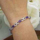 4.49 Carat (ctw) Sterling Silver Real Oval Cut Amethyst & Round Cut White Diamond Ladies Infinity Link Tennis Bracelet