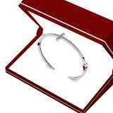 0.10 Carat (ctw) Sterling Silver Round Cut White Diamond Ladies Sideways Cross Bangle Bracelet 1/10 CT