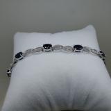 4.11 Carat (ctw) Sterling Silver Real Oval Cut Blue Sapphire & Round Cut White Diamond Ladies Infinity Link Tennis Bracelet