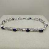 4.11 Carat (ctw) Sterling Silver Real Oval Cut Blue Sapphire & Round Cut White Diamond Ladies Infinity Link Tennis Bracelet