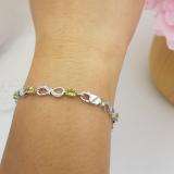 2.57 Carat (ctw) Sterling Silver Real Oval Cut Genuine Peridot & Round White Diamond Ladies Link Bracelet