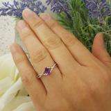 0.50 Carat (ctw) 10K White Gold Oval Cut Amethyst & Round Cut White Diamond Ladies Bridal Swirl Split Shank Engagement Promise Ring 1/2 CT