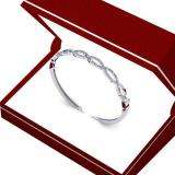 0.08 Carat (ctw) Sterling Silver Round Cut White Diamond Ladies Swirl Bangle Bracelet