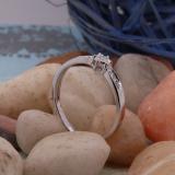 0.08 Carat (ctw) Sterling Silver Round White Diamond Ladies Solitaire With Accent Engagement Bridal Promise Ring