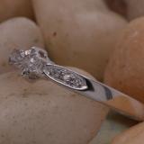 0.08 Carat (ctw) Sterling Silver Round White Diamond Ladies Solitaire With Accent Engagement Bridal Promise Ring