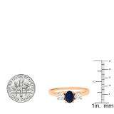 1.10 Carat (ctw) 10K Rose Gold Oval Cut Blue Sapphire & Round Cut White Diamond Ladies Bridal 3 Stone Engagement Ring 1 CT