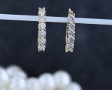 0.85 Carat (ctw) 10K Yellow Gold Round Cut White Diamond Ladies Huggies Hoop Earrings