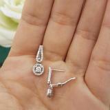 0.60 Carat (ctw) 14K White Gold Round White Diamond Ladies Halo Style Dangling Drop Earrings