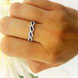 0.35 Carat (Ctw) 10K White Gold Round Blue Sapphire & White Diamond Ladies Bridal Stackable Anniversary Wedding Band Swirl Ring