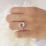 2.20 Carat (ctw) 10K Rose Gold Oval Cut Morganite & Round Cut White Diamond Ladies Halo Bridal Engagement Ring