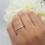 0.15 Carat (Ctw) Sterling Silver Round Cut White Diamond Ladies Swirl Anniversary Wedding Stackable Band