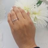 0.15 Carat (Ctw) Sterling Silver Round Cut White Diamond Ladies Swirl Anniversary Wedding Stackable Band