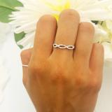 0.20 Carat (ctw) 14K White Gold Round Diamond Ladies Infinity Crossover Swirl Wedding Band