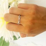 0.20 Carat (ctw) 14K White Gold Round Diamond Ladies Infinity Crossover Swirl Wedding Band
