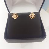0.02 Carat (ctw) 18K Yellow Gold Round Cut White Diamond Ladies Flower Shaped Stud Earrings