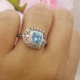 1.75 Carat (ctw) 10K Rose Gold Cushion Cut Blue Topaz & Round Cut Champagne & White Diamond Ladies Halo Style Bridal Engagement Ring