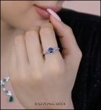 1.65 Carat (ctw) Sterling Silver Center Oval Cut London Blue Topaz & Side Heart Cut Swiss Blue Topaz & Round Cut White Diamond Ladies 3 Stone Bridal Engagement Ring