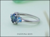 1.65 Carat (ctw) Sterling Silver Center Oval Cut London Blue Topaz & Side Heart Cut Swiss Blue Topaz & Round Cut White Diamond Ladies 3 Stone Bridal Engagement Ring