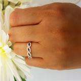 0.28 Carat (ctw) 10K White Gold Round Blue Sapphire & White Diamond Ladies Bridal Stackable Anniversary Wedding Band Swirl Ring 1/4 CT