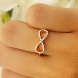 0.10 Carat (ctw) 18K Yellow Gold Round White Diamond Ladies Swirl Infinity Love Promise Ring 1/10 CT