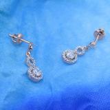 0.40 Carat (ctw) 10K White Gold Round Cut White Diamond Ladies Infinity Swirl Dangling Drop Earrings
