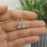 0.40 Carat (ctw) 10K Yellow Gold Round Cut White Diamond Ladies Infinity Swirl Dangling Drop Earrings