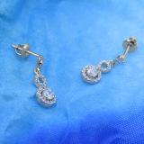 0.40 Carat (ctw) 10K Yellow Gold Round Cut White Diamond Ladies Infinity Swirl Dangling Drop Earrings