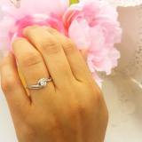 0.15 Carat (ctw) 14K White Gold Round White Diamond Ladies Swirl Split Shank Bridal Promise Engagement Ring