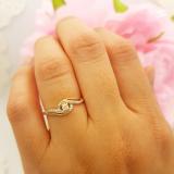 0.15 Carat (ctw) 18K Yellow Gold Round White Diamond Ladies Swirl Split Shank Bridal Promise Engagement Ring
