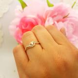 0.15 Carat (ctw) 18K Yellow Gold Round White Diamond Ladies Swirl Split Shank Bridal Promise Engagement Ring