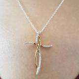 0.12 Carat (ctw) 14K Yellow Gold Round White Diamond Ladies Cross Pendant